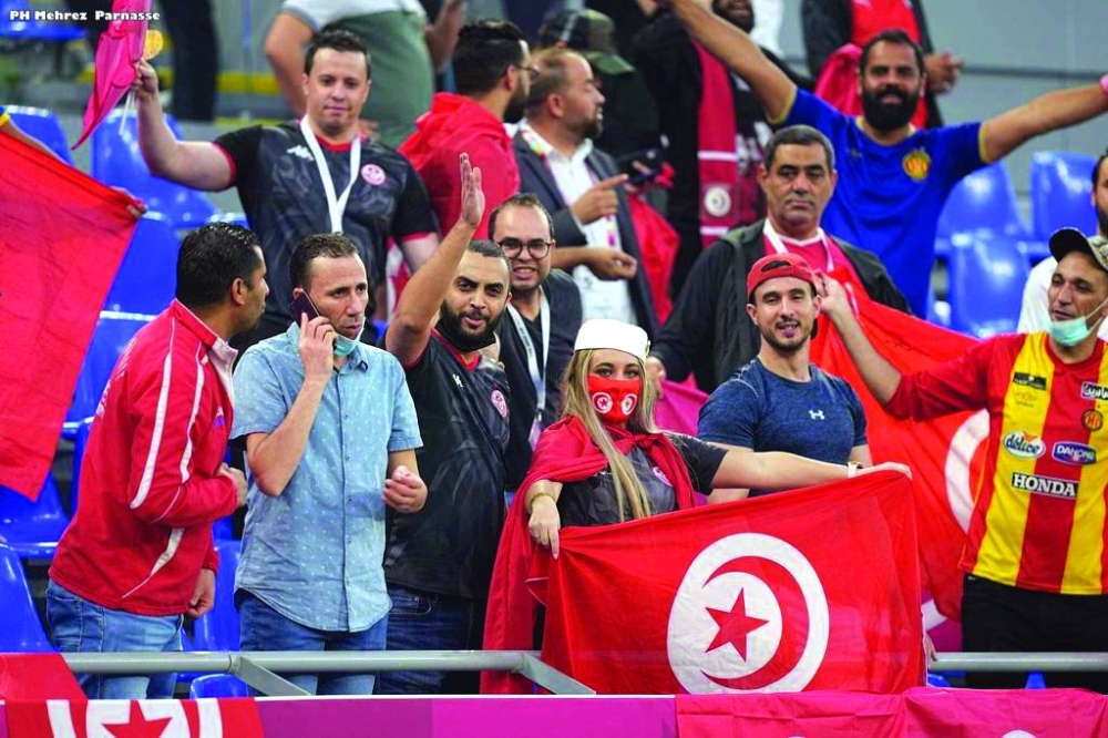 Adel Larbi with Tunisia fans in 974 stadium, the Arab Cup 2021