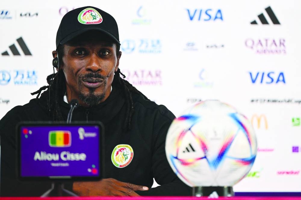 Senegal's coach Aliou Cisse attends a press conference at the Qatar National Convention Center (QNCC) in Doha. (AFP)