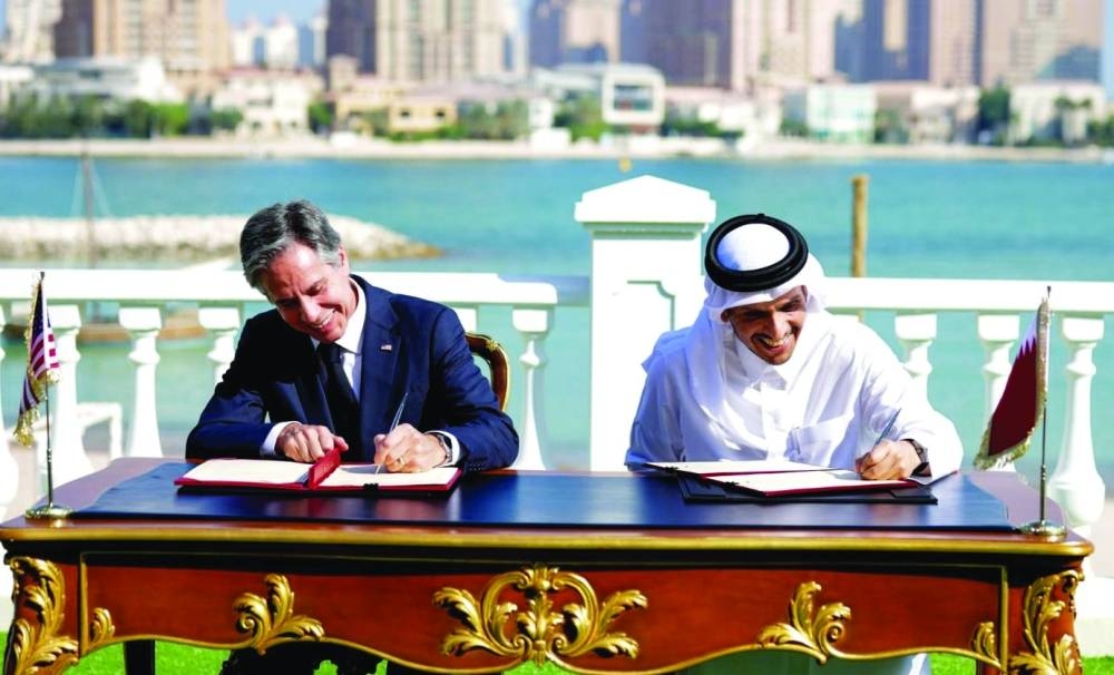 HE Sheikh Mohamed and Blinken sign the letter of intent. PICTURE: Shaji Kayamkulam