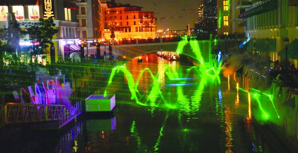 Laser show dazzles spectators.