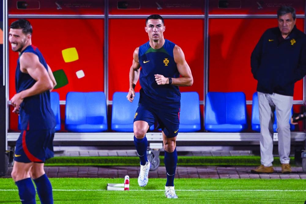 Portugal’s Cristiano Ronaldo takes part in a training session at Al Shahania SC in Al Samriya, northwest of Doha, yesterday. (AFP)