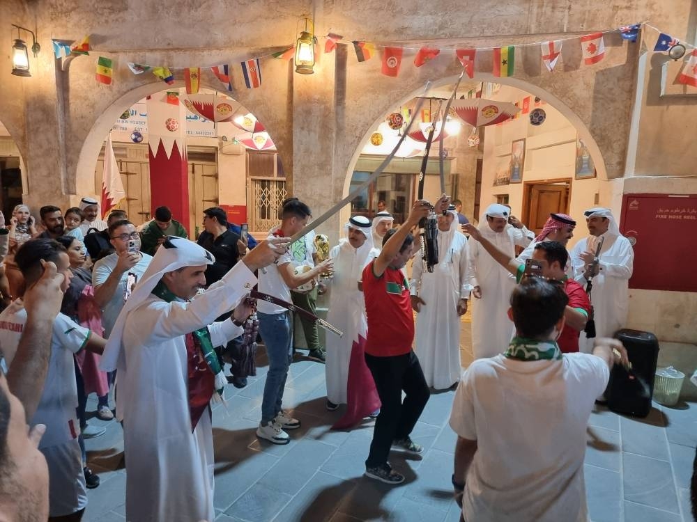Sword dance welcomes football fans who celebrate outside the four corners of the stadium. PICTURES: Joey Aguilar