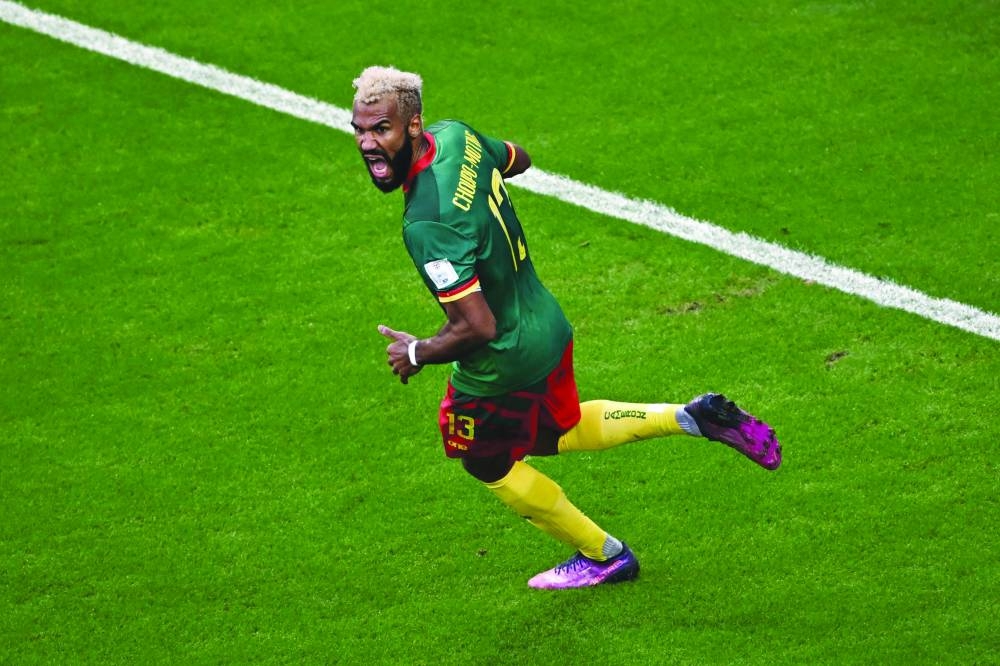 Cameroon’s forward Eric Maxim Choupo-Moting celebrates scoring his team’s third goal during the Qatar 2022 World Cup Group G match against Serbia at the Al Janoub Stadium in Al Wakrah yesterday. (AFP)