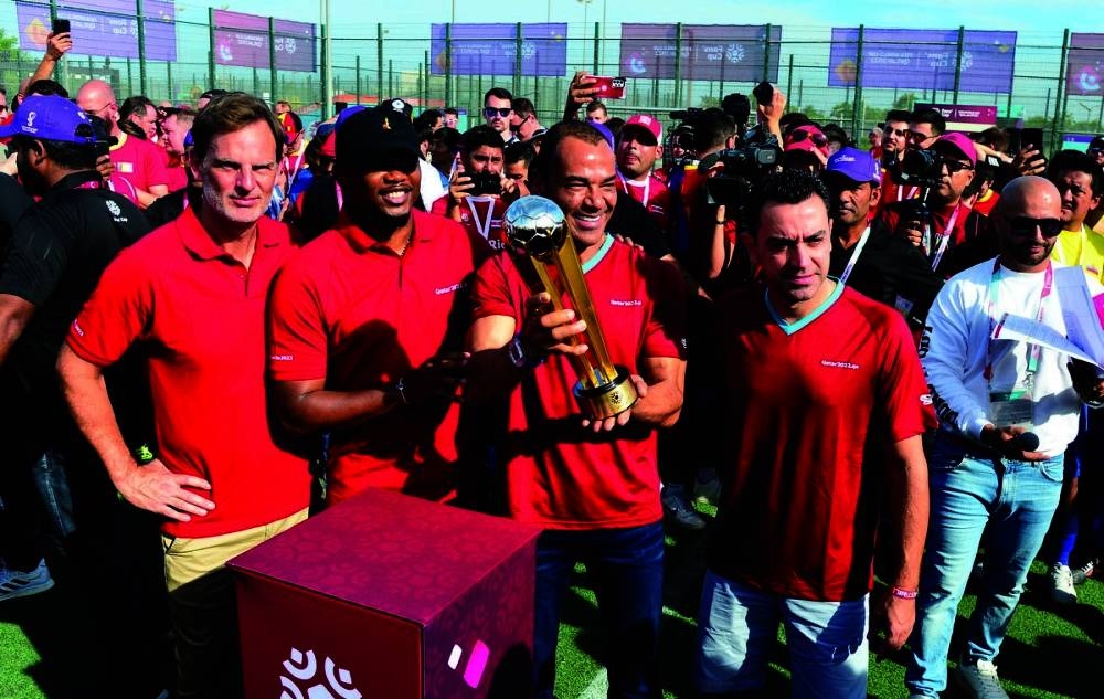  Marcos Evangelista de Morais (Cafu), along with other Legacy Ambassadors Ronald de Boer Samuel Eto’o, and Xavi Hernandez, raised the Fans' Cup trophy during the opening ceremony of the tournament Tuesday at the FIFA Fans Cup 2022. PICTURE: Shaji Kayamkulam.