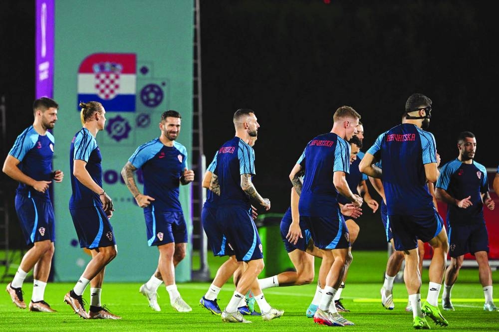 Croatia players take part in a training session at the Al Erssal training site in Doha yesterday.
