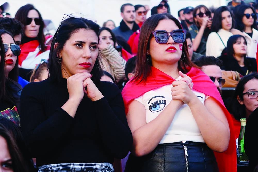 Tunisia fans watch the match at the fan zone in Tunis.