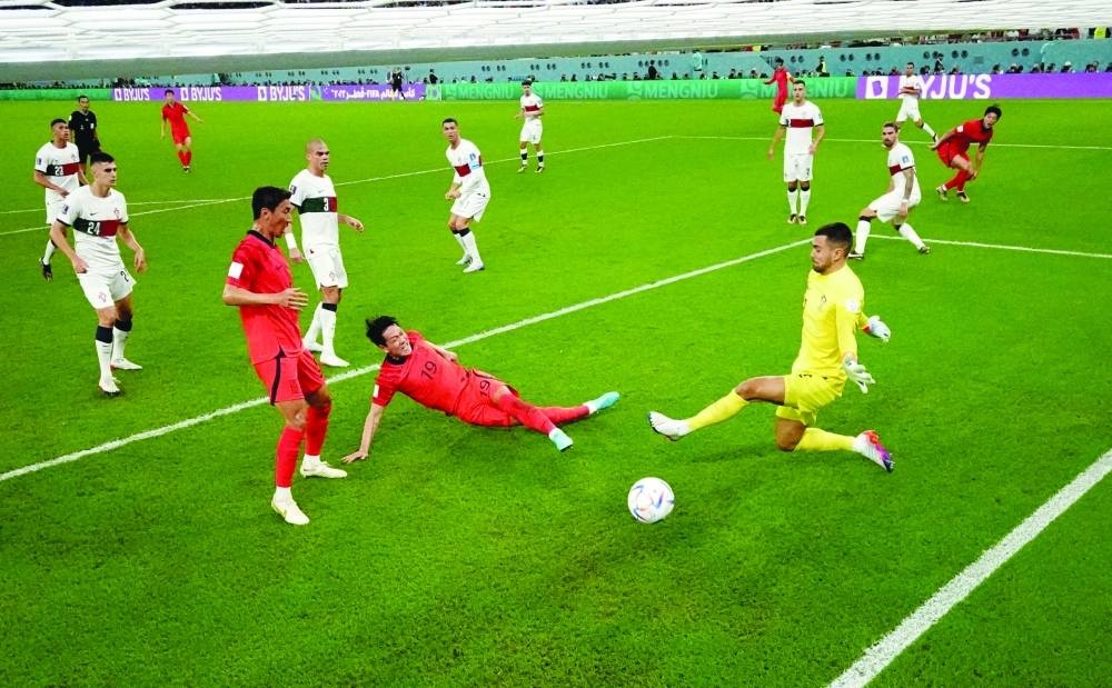 South Korea's Kim Young-gwon scores their first goal against Portugal during the FIFA World Cup Qatar 2022 - Group H - match Education City Stadium Friday. Reuters
