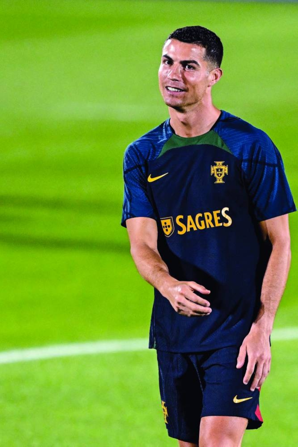 Portugal's forward Cristiano Ronaldo takes part with his teammates in a training session at Shahaniya Sports Club 