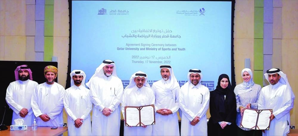 HE the Minister of Sports and Youth Salah bin Ghanim al-Ali, QU president Dr Hassan al-Derham and other officials at the MoU signing ceremony.