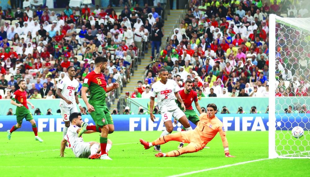 Portugal’s Goncalo Ramos scores their third goal during the Qatar 2022 Round of 16 match against Switzerland at Lusail Stadium in Lusail yesterday. (Reuters)