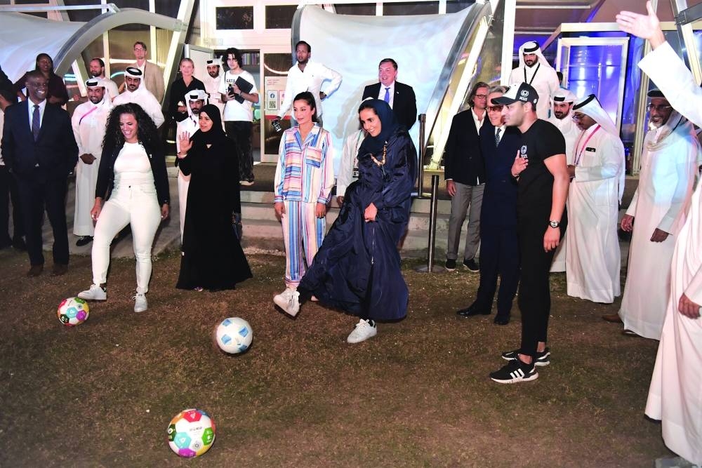 HE Sheikha Al Mayassa bint Hamad bin Khalifa al-Thani kicks a football to launch the conference.
