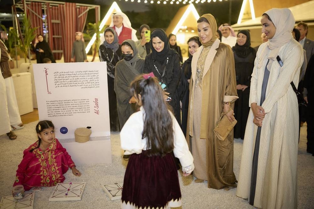 Her Highness Sheikha Moza bint Nasser attends the opening ceremony of the second edition of Dreesha Performing Arts Festival Sunday. PICTURES: AR Al-Baker.