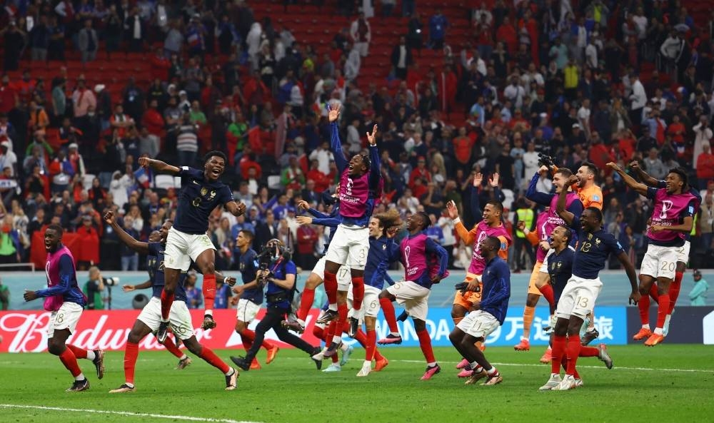 French players celebrate after their victory.