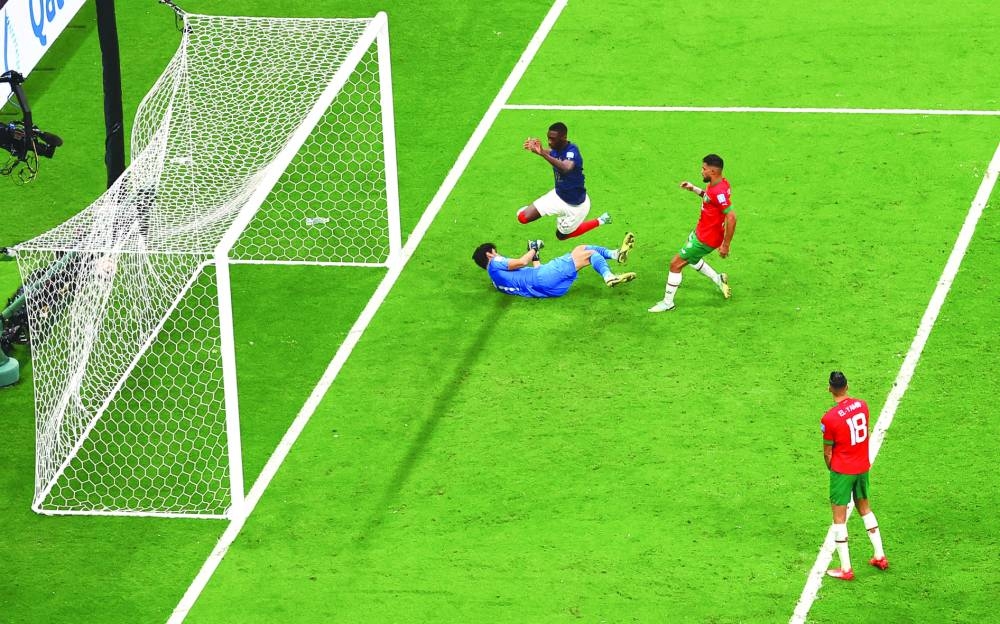 France’s Randal Kolo Muani celebrates scoring their second goal. (Reuters)