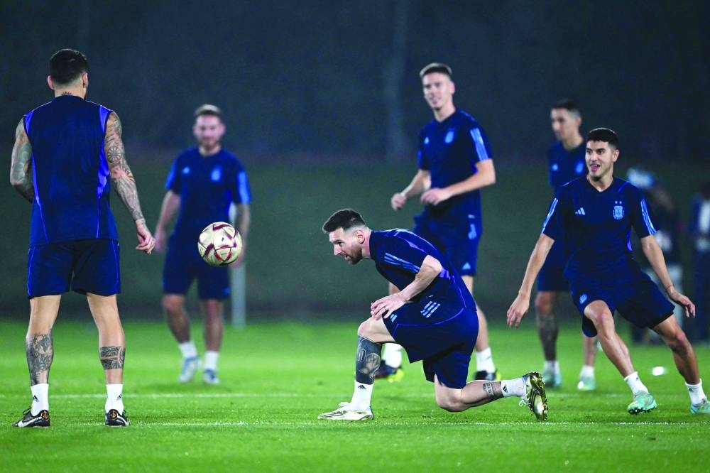 Argentina’s Lionel Messi during a training a session at Qatar University Training Site 3 in Doha yesterday, on the eve of the FIFA World Cup Qatar 2022 final against France. (Reuters)