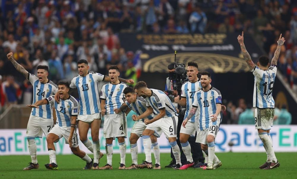 Argentina's Lionel Messi and teammates celebrate 