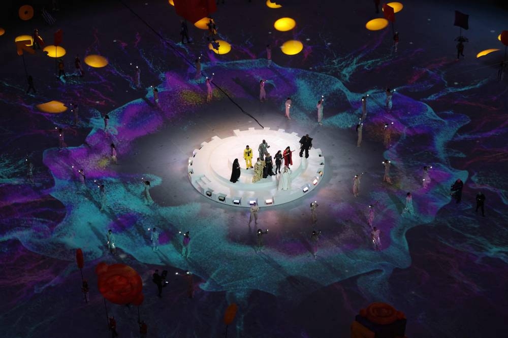 Artists perform during the closing ceremony of the Qatar 2022 World Cup. (AFP)