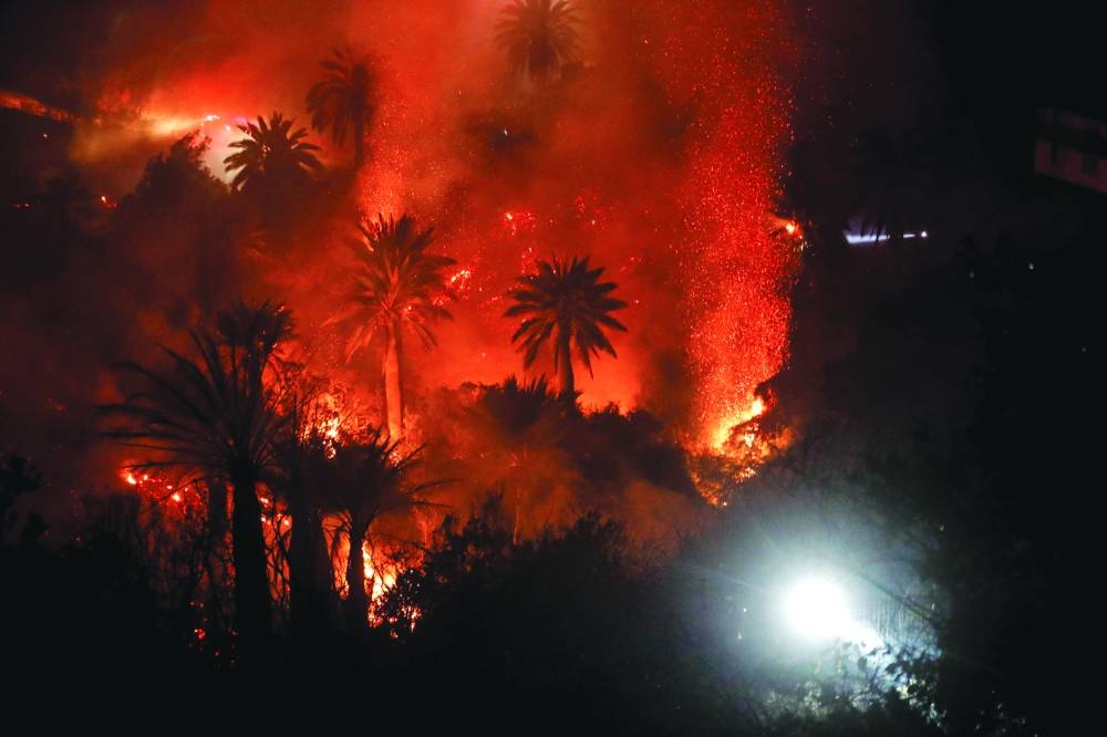 A forest fire is seen on the hills of Vina del Mar, where hundreds of houses are located, in Chile’s Valparaiso Region.