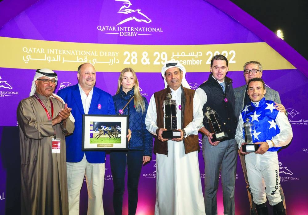 Connections of Image Du Croate celebrate after victory in the Qatar Oaks Purebred Arabians four-year-old Fillies Only (Far Bend).

