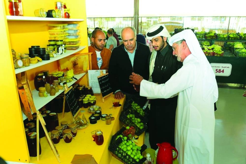Officials at the opening of the Honey and Dates Festival at Al Mazrouah Yard. Supplied picture.