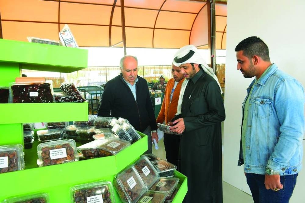 Officials touring the week-long Honey and Dates Festival which opened Thursday at Al Mazrouah Yard. Supplied picture.