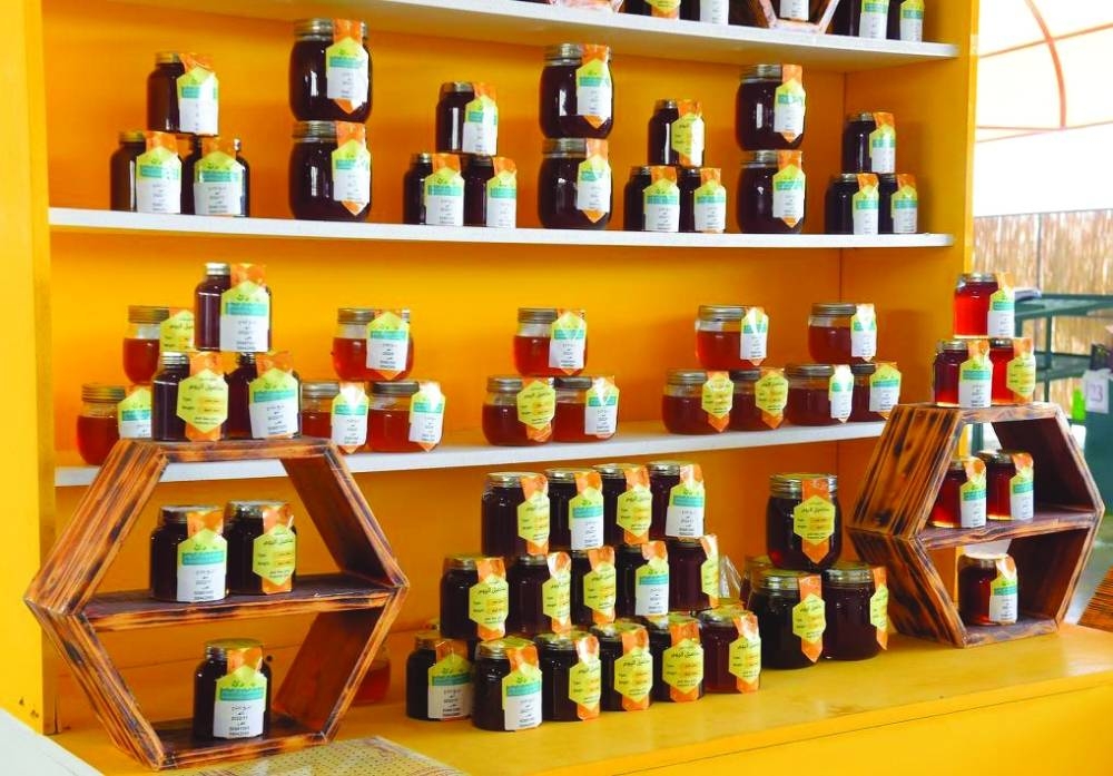 Bottles of Qatari honey on display at the week-long Honey and Dates Festival which opened at Al Mazrouah Yard. Supplied picture.