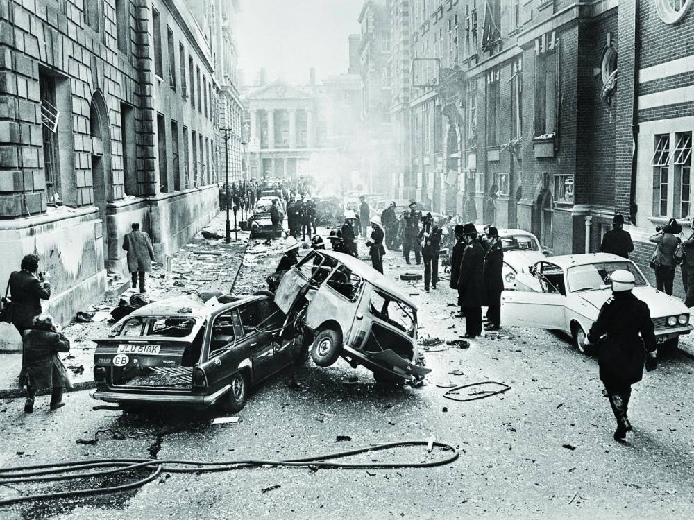 This photo taken on March 8, 1973 shows a street near Whitehall, shows the aftermath of an IRA car bomb explosion in London. (AFP)