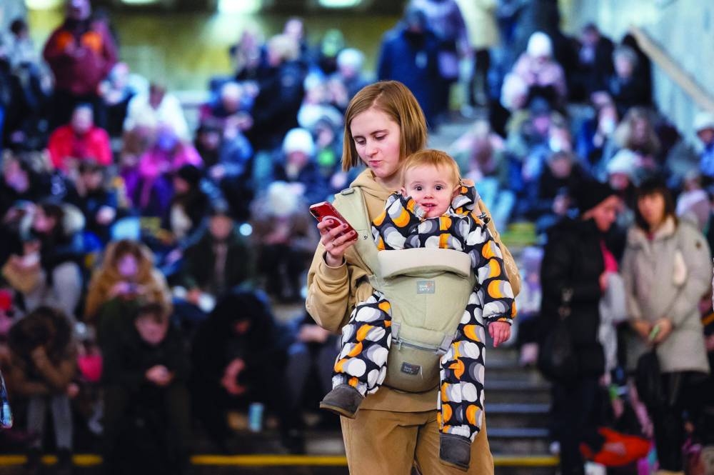 People take shelter inside a metro station during massive Russian missile attacks in Kyiv, Ukraine December 29, 2022. (REUTERS)