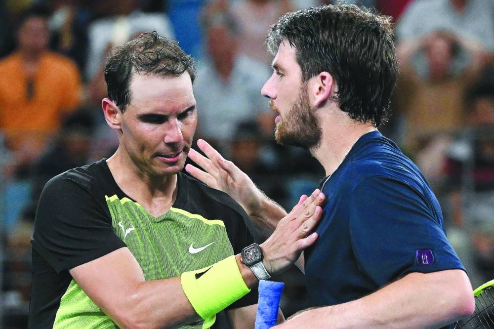 Britain’s Cameron Norrie (right) talks to Rafael Nadal of Spain after winning the match on day three of the United Cup in Sydney yesterday. (AFP)