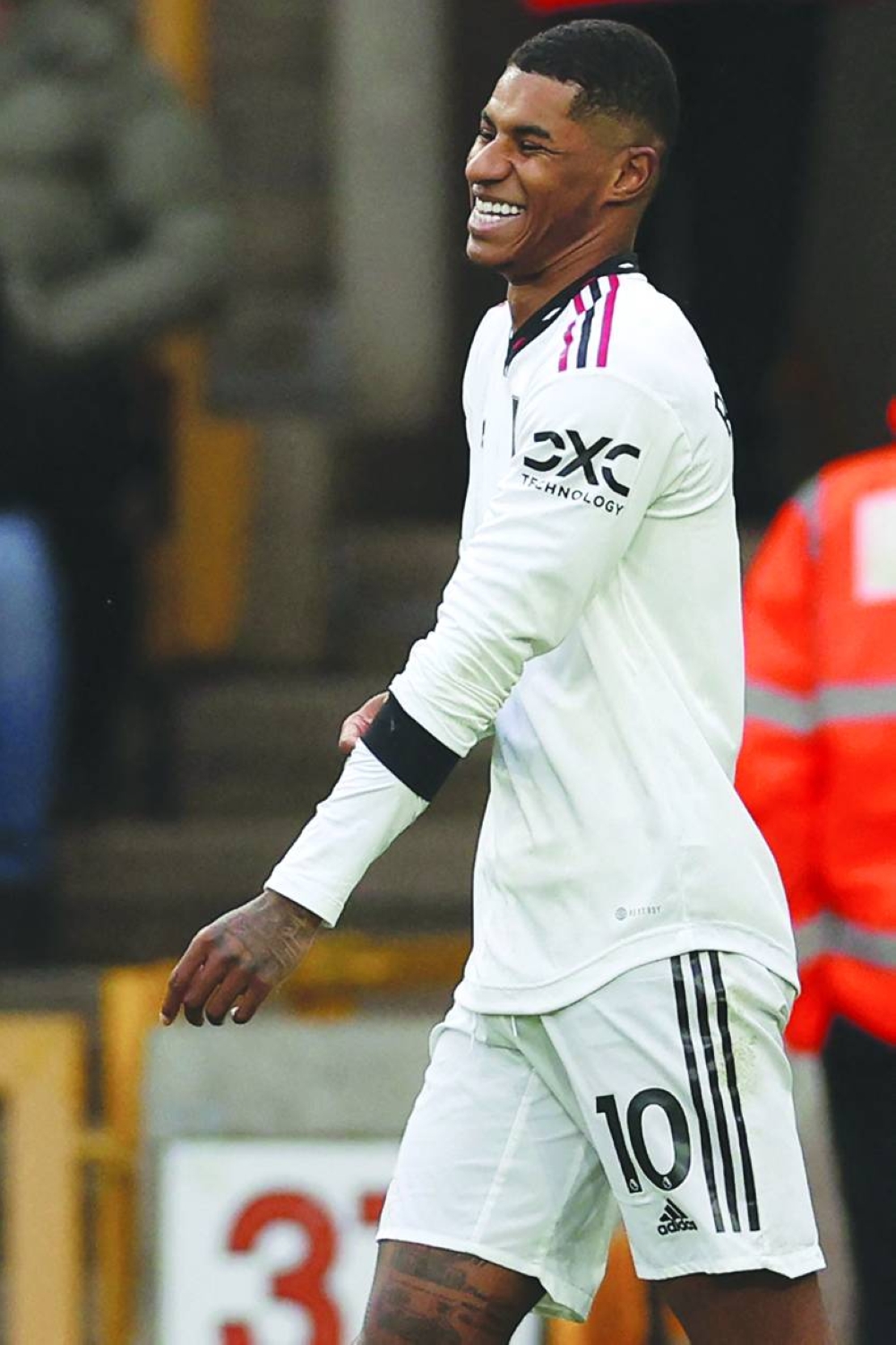 Manchester United’s Marcus Rashford smiles after scoring against Wolverhampton Wanderers in Wolverhampton yesterday. (AFP) 