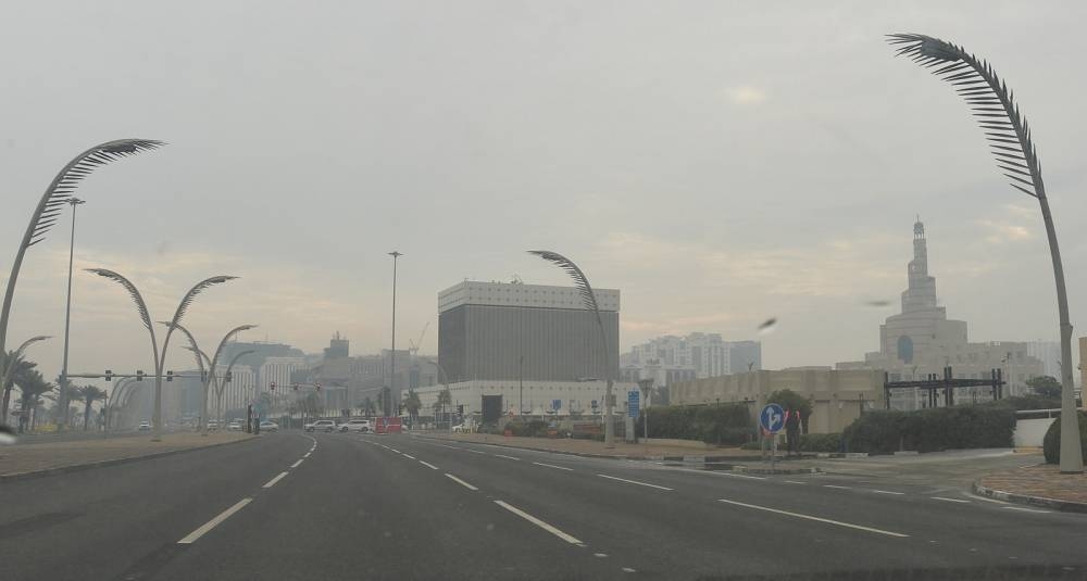 Rainy and cloudy conditions in Doha Tuesday. PICTURES: Shaji Kayamkulam and QNA