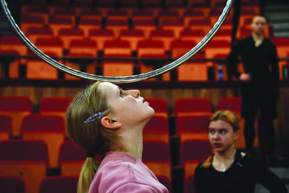 Ukrainian Maria Kravchenko rehearses before taking part in the Yaskrava Arena Dnipro International Children’s Circus Festival.