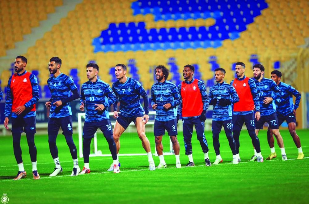 Cristiano Ronaldo takes part in a training session with his Al Nassr teammates.