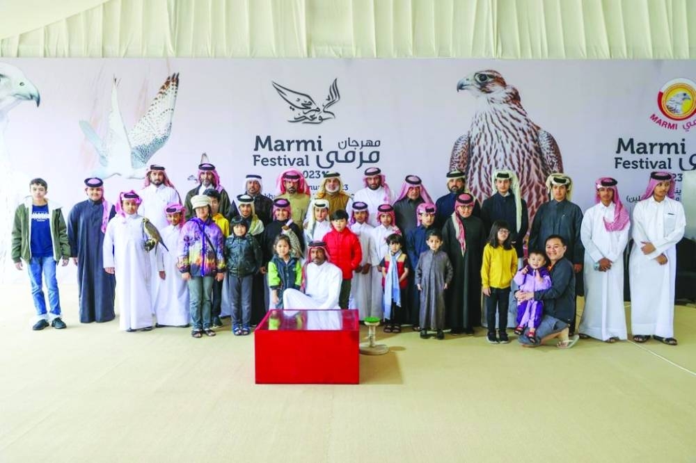 Young and aspiring falconers with officials