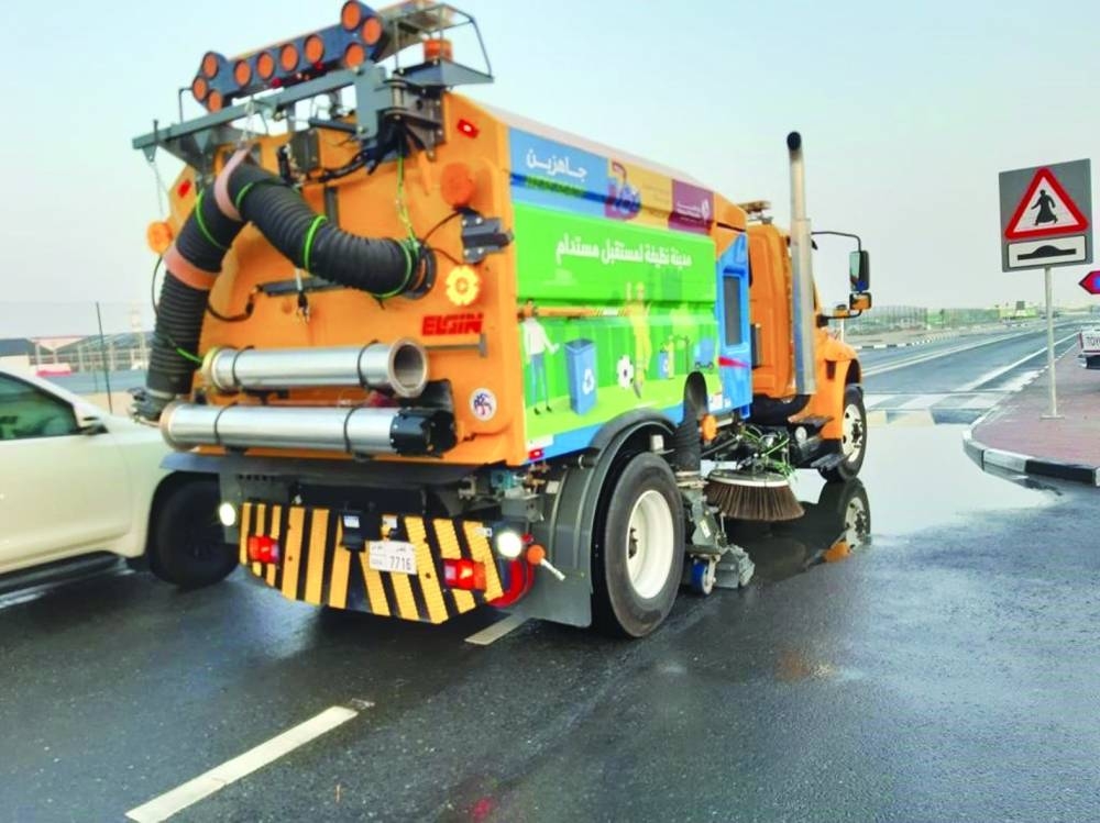 Rainwater removal and road cleanup works in progress. PICTURES: Shaji Kayamkulam and supplied