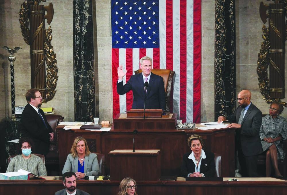 Newly elected Speaker of the US House of Representatives Kevin McCarthy takes the oath of office after he was elected on the 15th ballot at the US Capitol in Washington, DC.