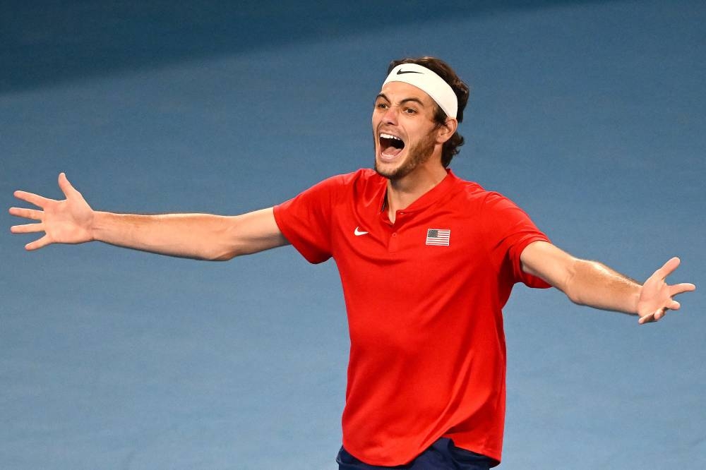 Taylor Fritz of the US celebrates victory against Italy’s Matteo Berrettini (AFP) 