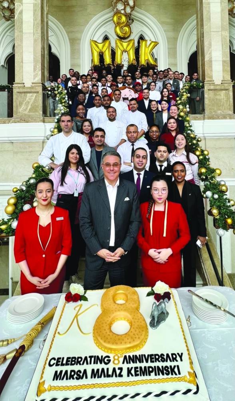 The Marsa Malaz Kempinski team celebrating the eighth anniversary