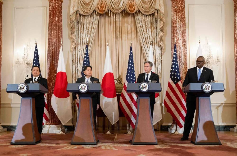 Japanese Defense Minister Yasukazu Hamada (L), Japanese Foreign Minister Yoshimasa Hayashi (2nd L), US Secretary of State Antony Blinken (2nd R) and US Secretary of Defense Lloyd Austin (R) hold a press conference following meetings at the US Department of State in Washington, DC. (Photo by AFP)