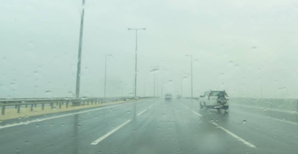 A rain-soaked road Saturday