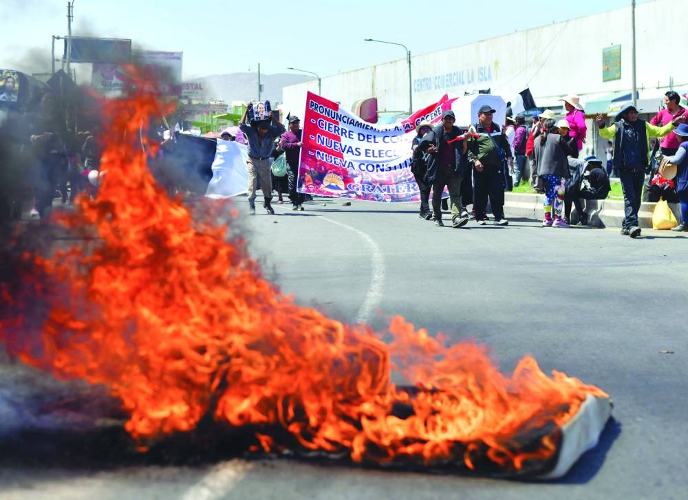 This picture taken on Thursday shows a blockade in the Pan-American highway at La Joya in Arequipa, Peru.