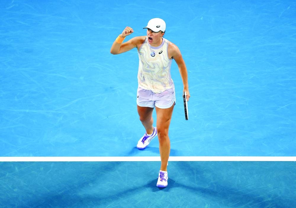 Poland’s Iga Swiatek reacts during her first round match against Germany’s Jule Niemeier yesterday. Swiatek won 6-4, 7-5. (Reuters)