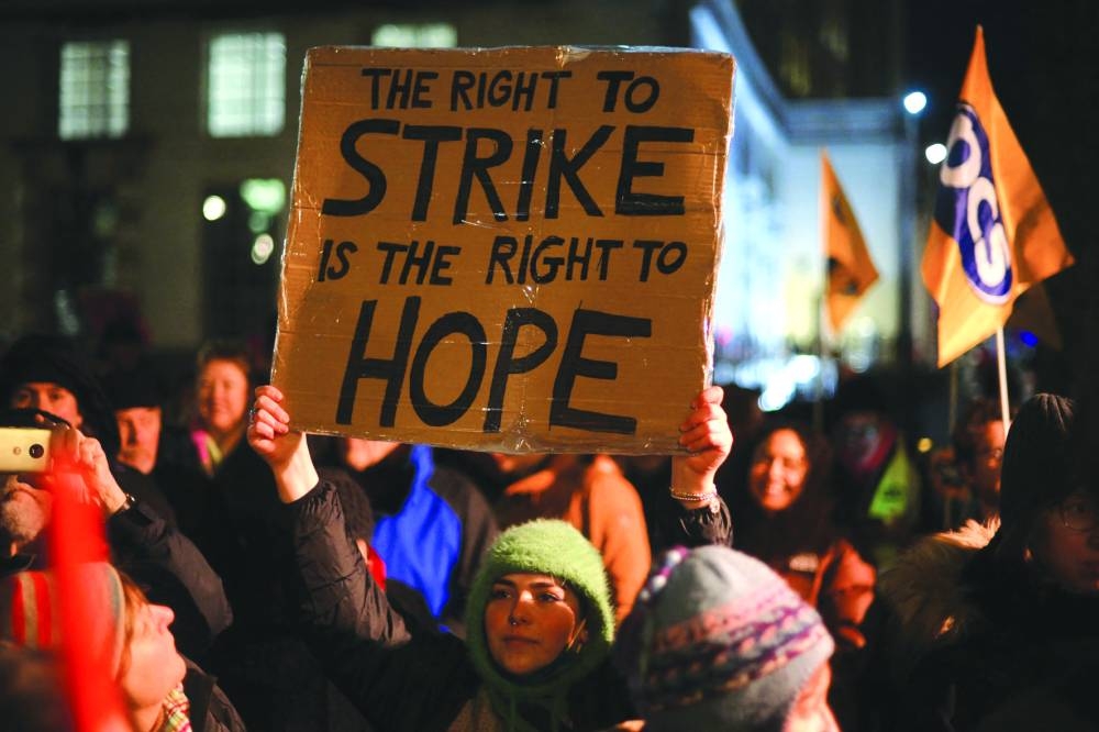 Demonstrators protest last night opposite 10 Downing Street in central London, against the government’s planned law on minimum service levels during strikes.
