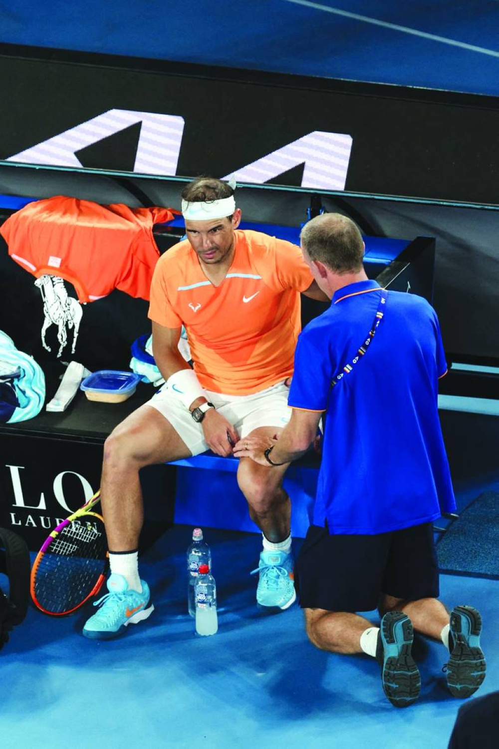 Spain’s Rafael Nadal gets medical attention during the break in the match against McDonald yesterday. (AFP)  