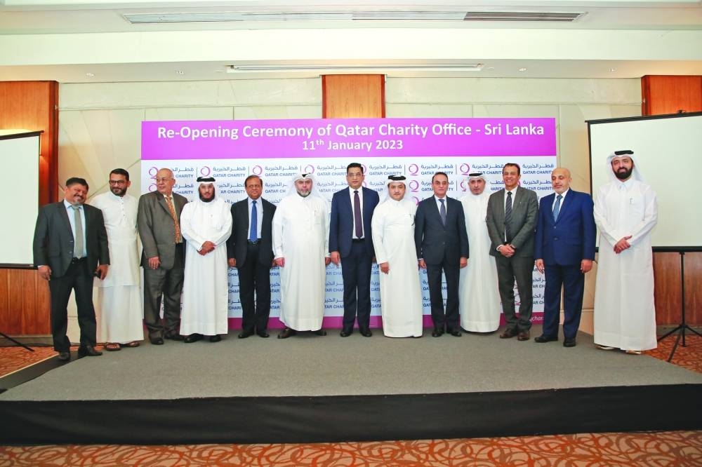 Officials pose for a group photo