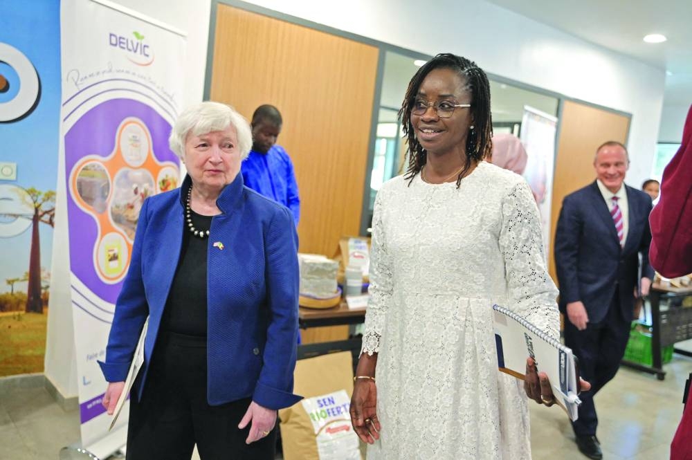 US Treasury Secretary Janet Yellen (left) is welcomed by Mame Aby Seye, Director of the General Delegation for Rapid Entrepreneurship for Women and Young People, during her visit in Dakar, on Friday..