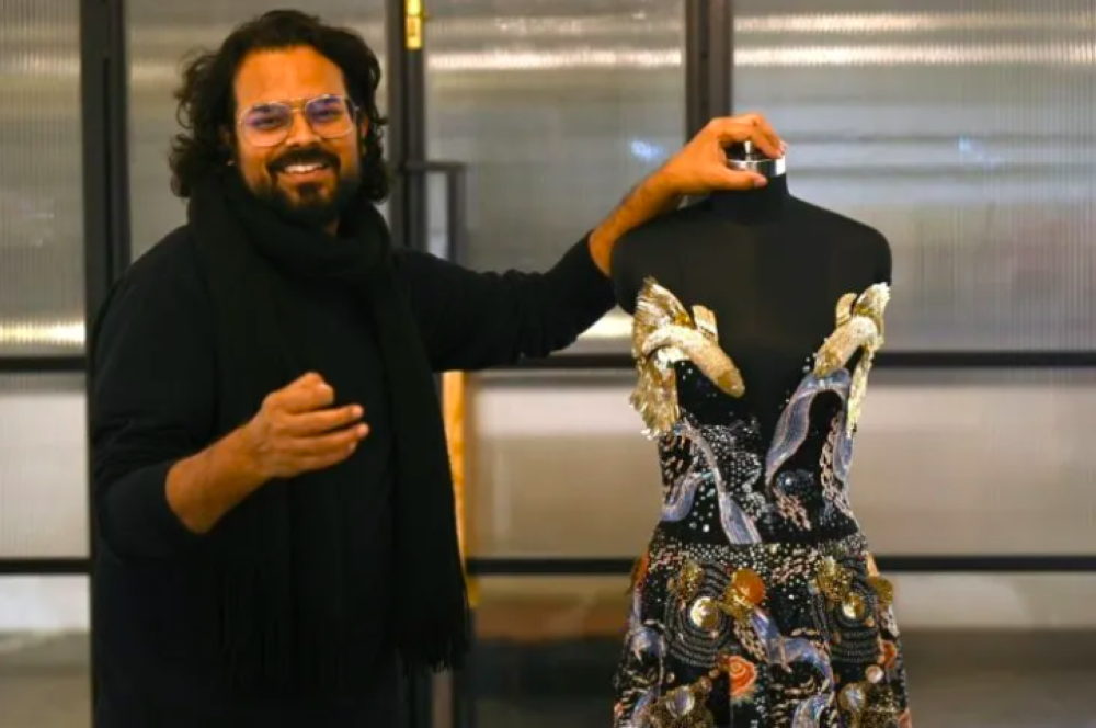 Indian fashion designer Rahul Mishra's new collection, "Cosmos", evokes the boundless mysteries of life, told through his trademark embroidered flourishes of animal contours and luminous details.
