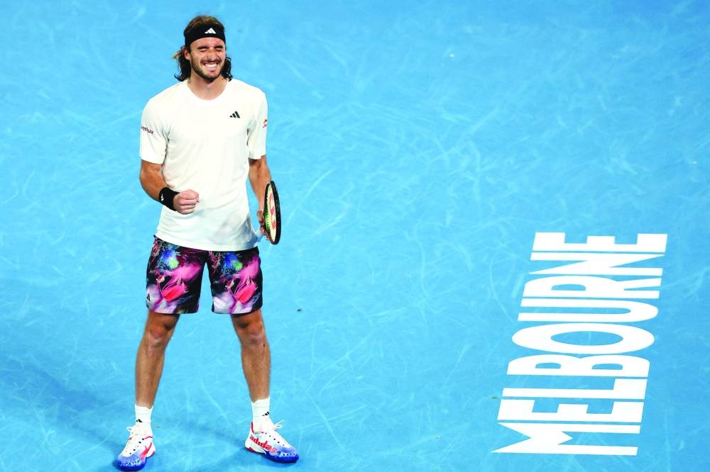 Greece's Stefanos Tsitsipas celebrates victory against Czech Republic's Jiri Lehecka (not pictured) after the singles quarter-final on day nine of the Australian Open in Melbourne on Tuesday. (AFP)
