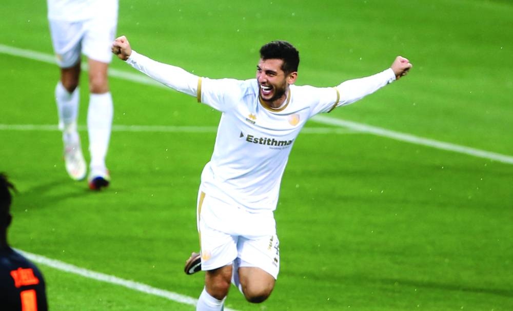 Qatar SC's Moataz Majed Bostami celebrates after scoring against Umm Salal.