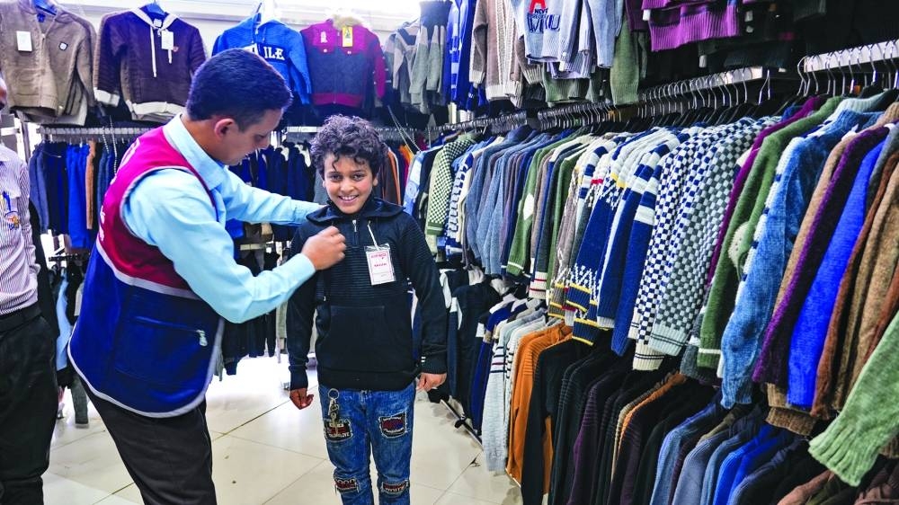  Snapshots from the Qatar Charity initiative. 